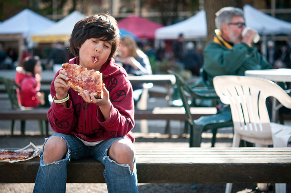 Boy Eating Pizza
